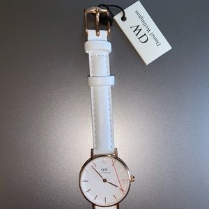 Daniel Wellington women’s white band watch.